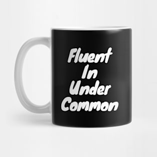 Fluent in under common Mug